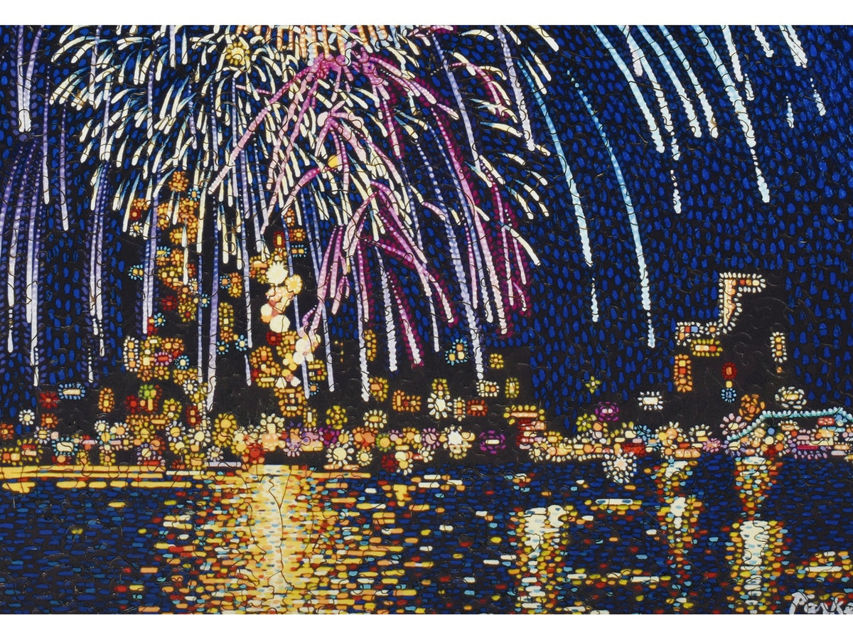 A closeup of the front of the puzzle, City Celebration, showing the detail in the pieces.