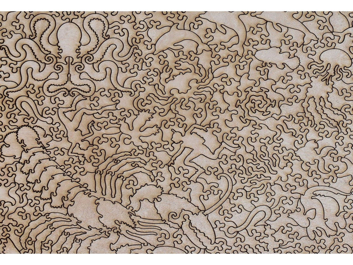 A closeup of the back of the puzzle, Dolphin's Wake, showing the detail in the pieces.