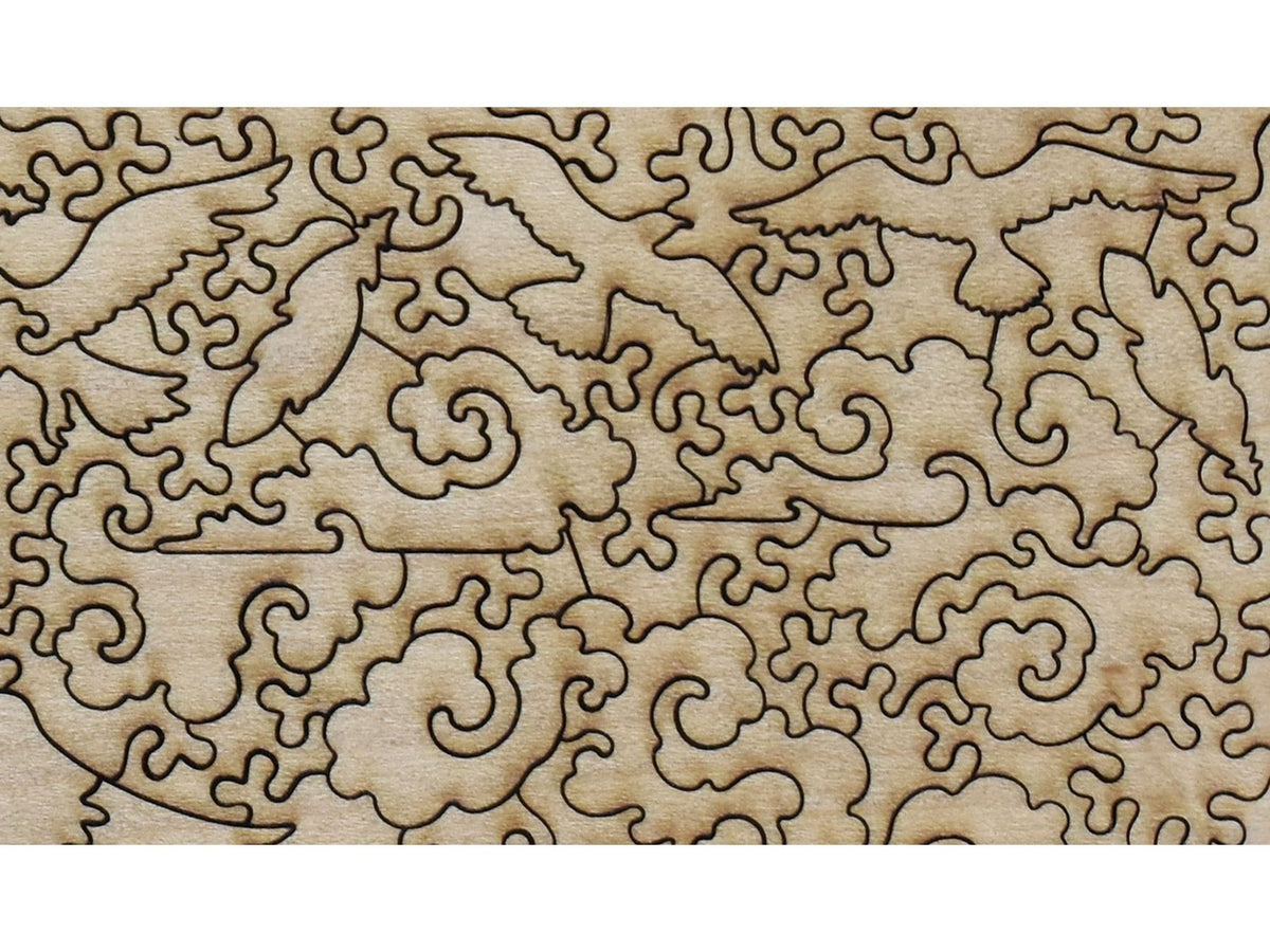 A closeup of the back of the puzzle, Étretat: The Beach and the Falaise d'Amont, showing the detail in the pieces.