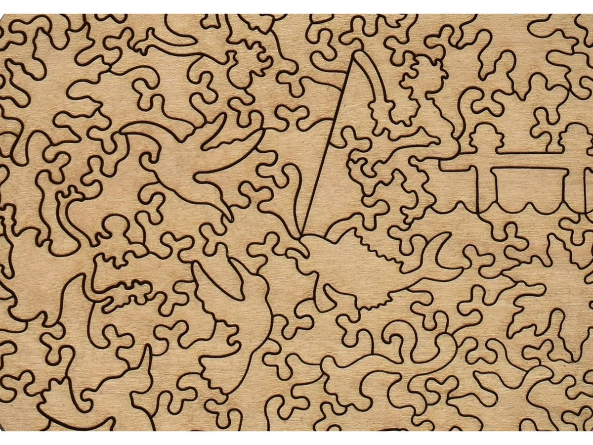 A closeup of the back of the puzzle, Japanese Bridge in Monet's Garden, showing the detail in the pieces.