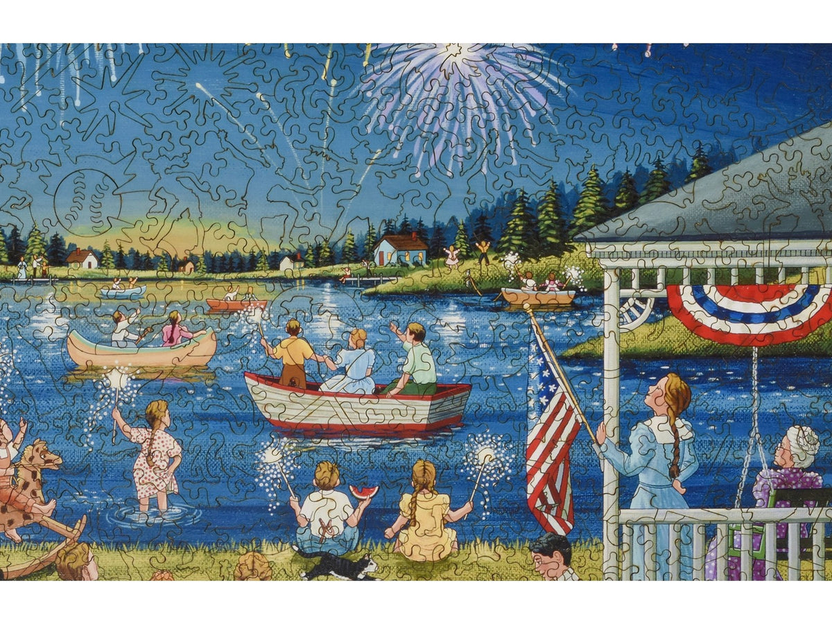 A closeup of the front of the puzzle, Lakeside on the Fourth, showing the detail in the pieces.
