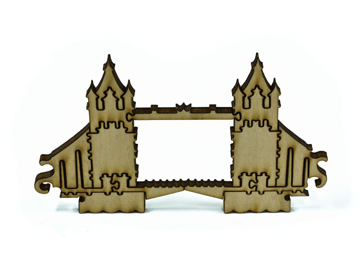 A closeup of pieces in the shape of London bridge.