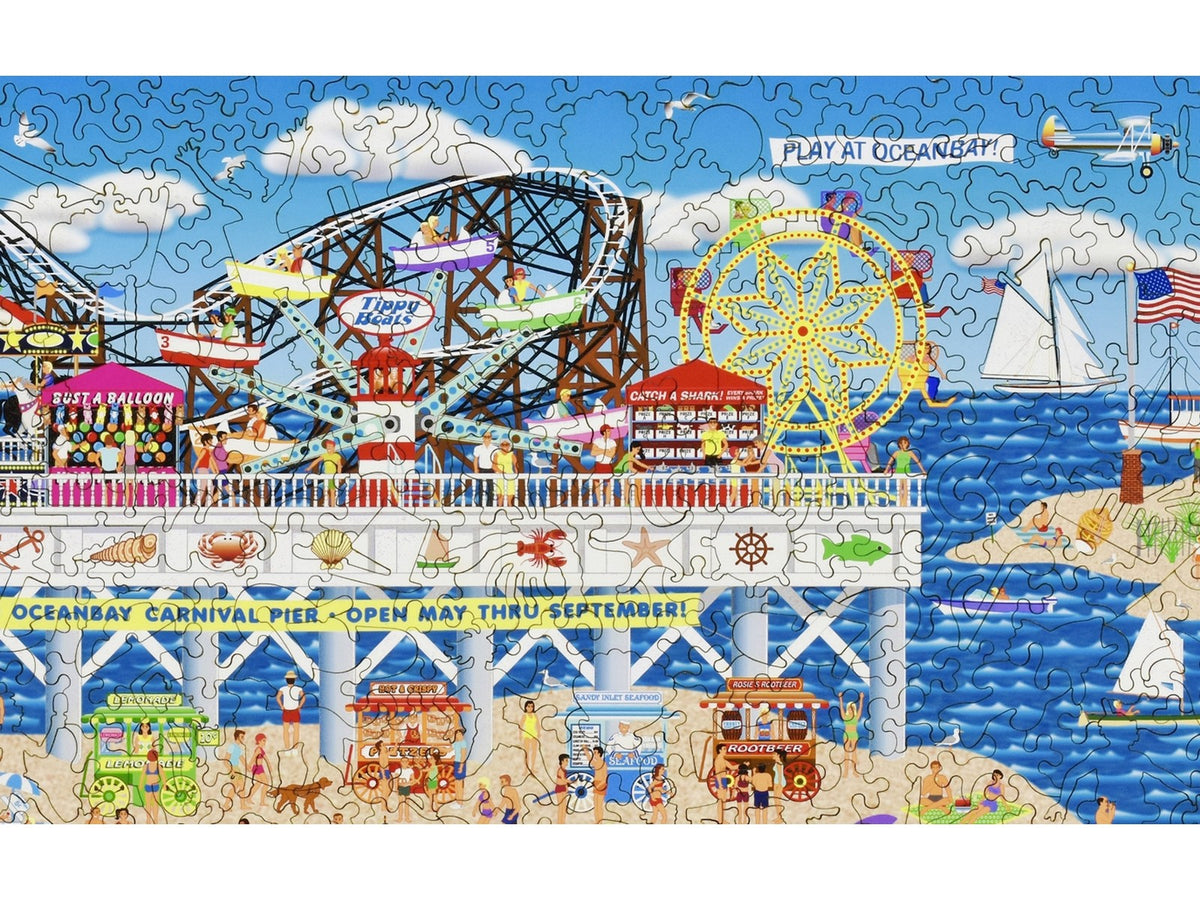 A closeup of the front of the puzzle, Oceanbay Carnival Pier, showing the detail in the pieces.
