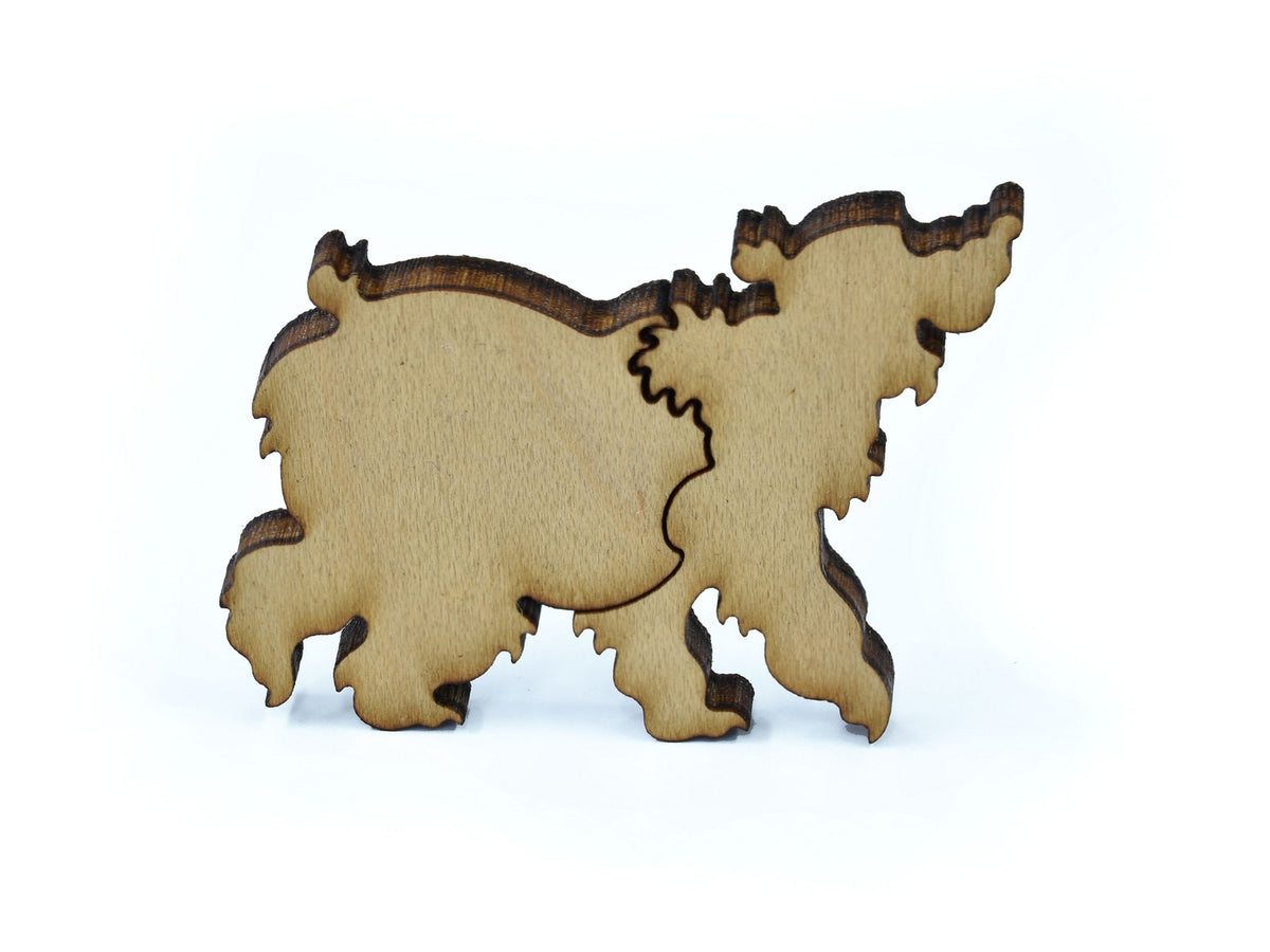 A closeup of pieces in the shape of a bear.