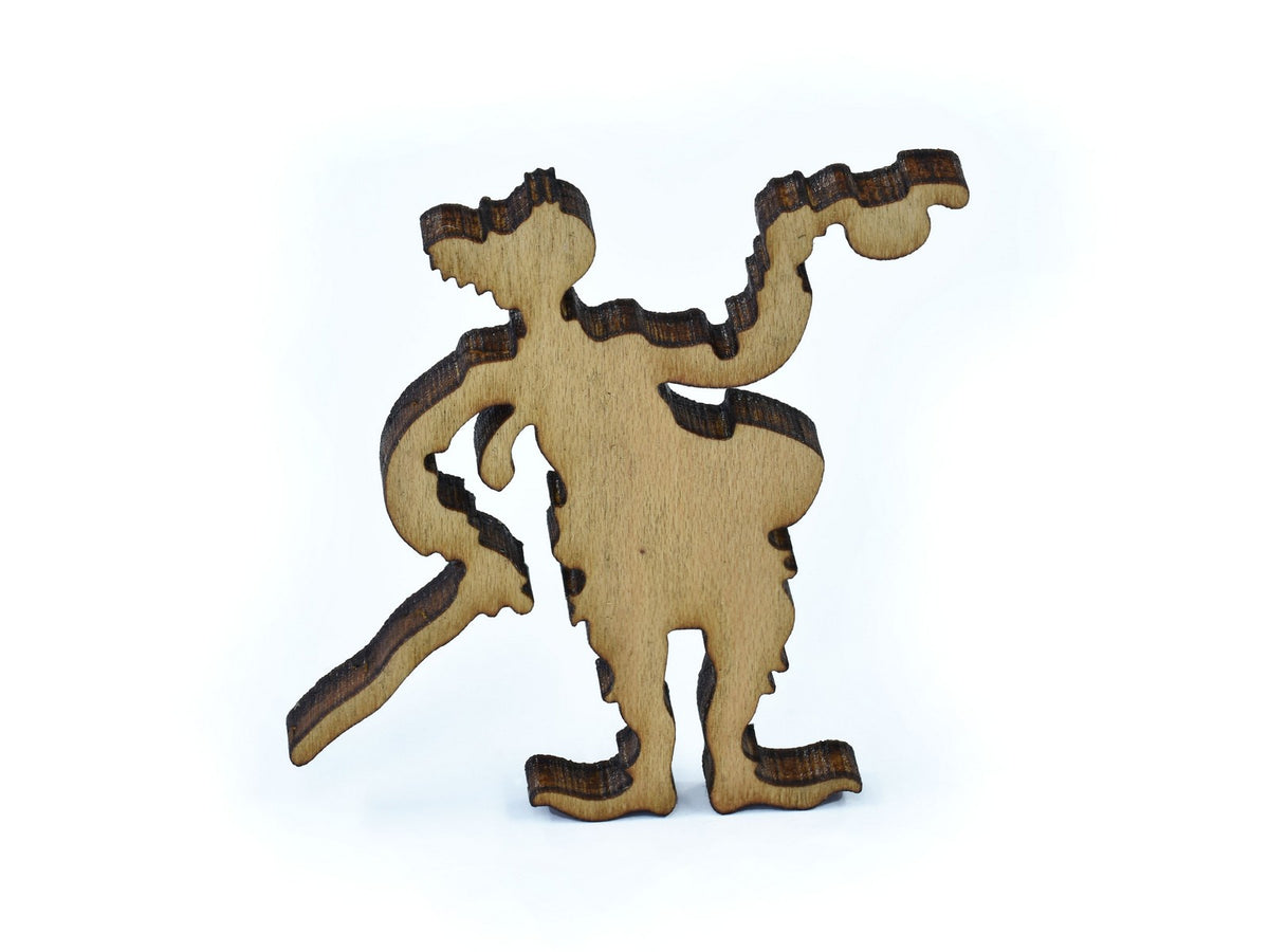 A closeup of pieces in the shape of a man with a cane.