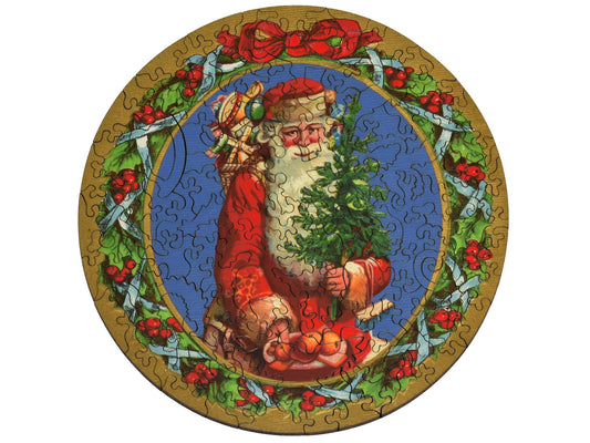 The front of the puzzle Santa's Treats, which shows Santa Claus holding a plate of treats and a small Christmas tree, with a decorative border.