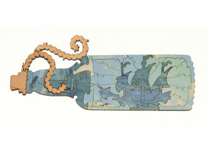 A closeup of pieces in the shape of a ship in a bottle.