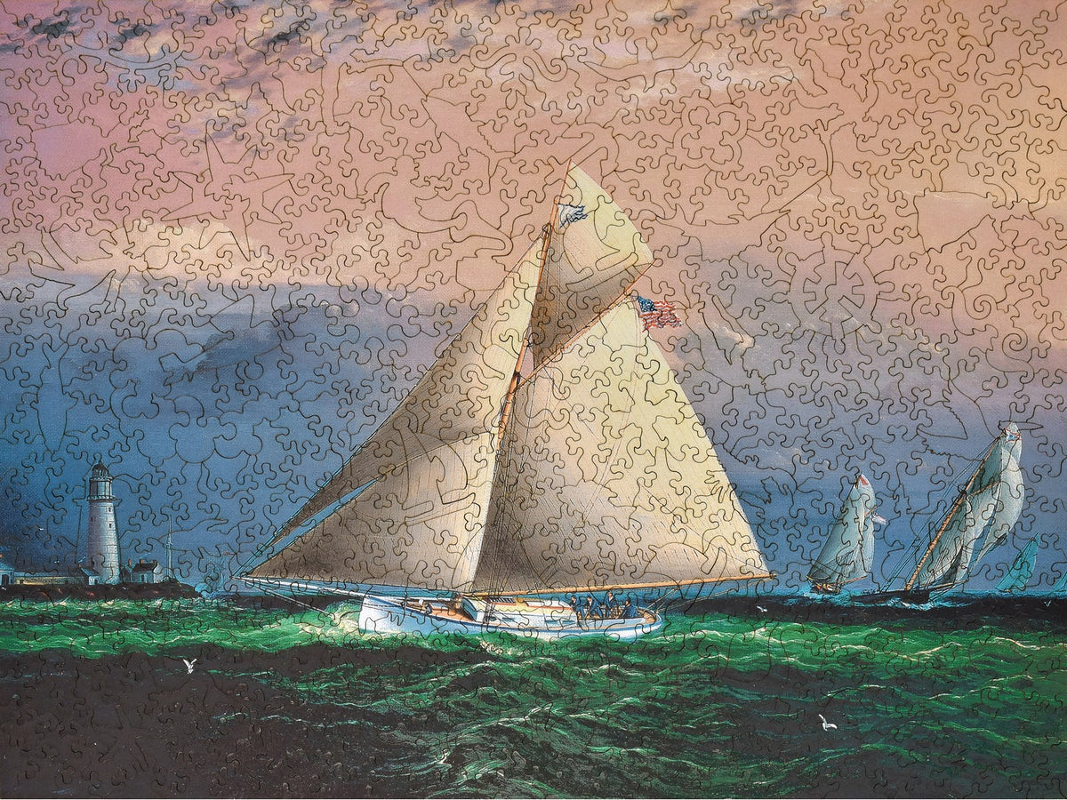 The front of the puzzle, Yacht Race Off Boston Light, showing sailboats racing.