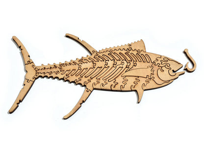 A closeup of pieces in the shape of a tuna fish.