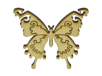 A closeup of pieces in the shape of another butterfly.