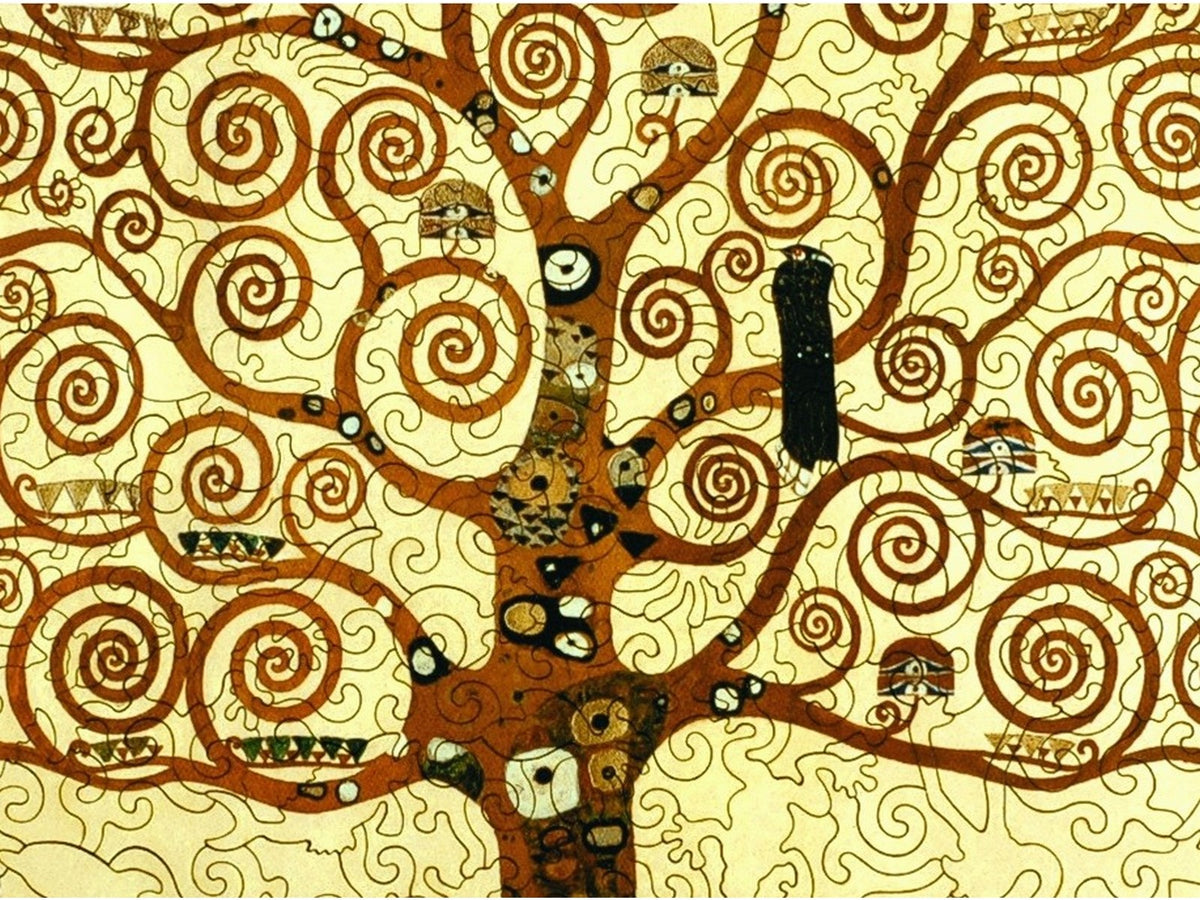 A closeup of the front of the puzzle, Tree of Life, by Gustav Klimt, showing the detail in the pieces.