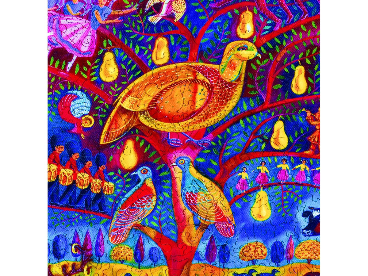 A closeup of the front of the puzzle, The Twelve Days of Christmas, showing the detail in the pieces.