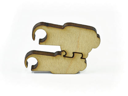 A closeup of pieces in the shape of Binoculars.