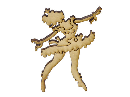 A closeup of pieces in the shape of a ballerina. 