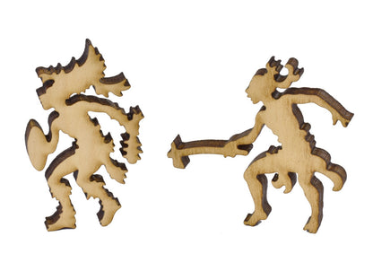 A closeup of pieces in the shape of two warriors.